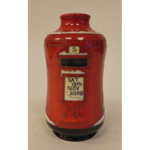 119 - A Moorcroft pottery 'Trial' vase, fashioned as a pillar box  bears printed & painted marks&... 