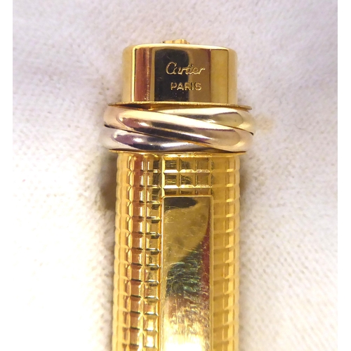 16 - A Cartier gilded and textured, oval shape fountain pen 76995  1*197*  boxed