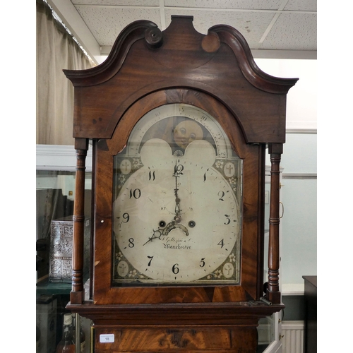 18 - An early 19thC mahogany longcase clock, the hood with a swan neck pediment, over an arched window an... 