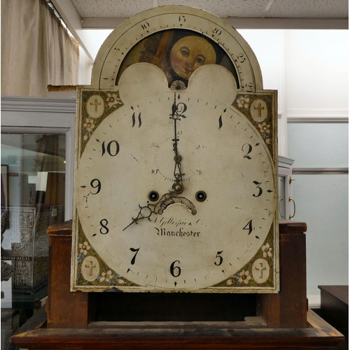 18 - An early 19thC mahogany longcase clock, the hood with a swan neck pediment, over an arched window an... 