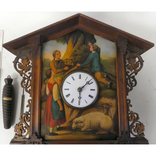 2 - A mid 19thC Black Forest wall mounted cuckoo clock, the case fashioned as a dual pitched chalet with... 