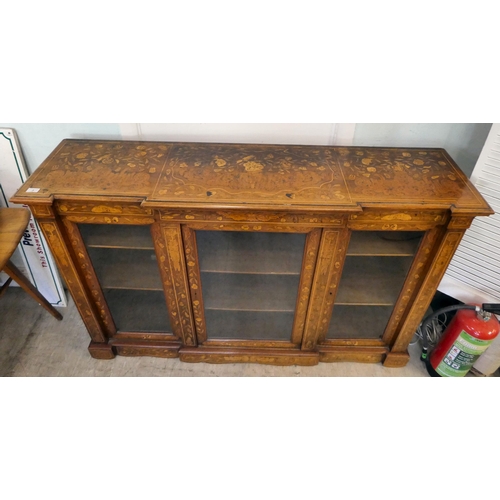 3 - A 19thC Continental rosewood and floral marquetry breakfront cabinet, comprising three inline, full ... 