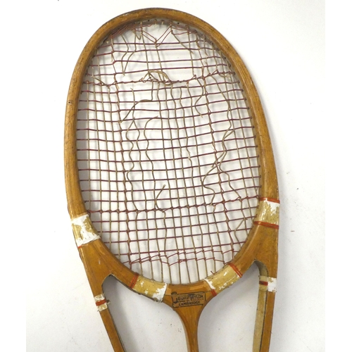 31 - A 1930s Hazells Streamline Red Star tennis racquet, bears various marks, including that of Joshua Ta... 