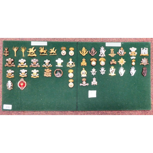 315 - Approx. forty-four Welsh and Irish regimental cap badges, some copies: to include Royal Welsh Fusili... 