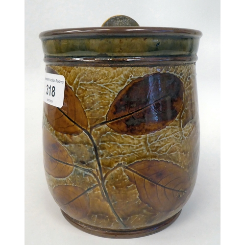 318 - A Royal Doulton stoneware tobacco jar, decorated in colours with autumnal leaves, the lid secured by... 