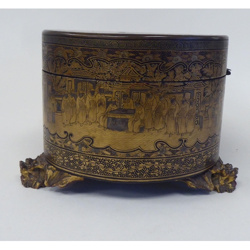 32 - A 19thC Chinese Export, lacquered and gilded tea casket of straight sided, serpentine outlined form,... 