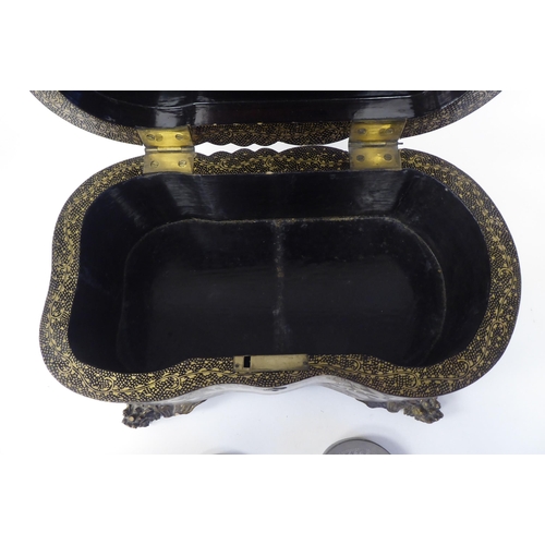 32 - A 19thC Chinese Export, lacquered and gilded tea casket of straight sided, serpentine outlined form,... 