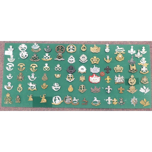 320 - Approx. sixty-five British military cap badges and other insignia, some copies: to include The Royal... 