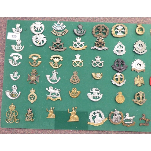 320 - Approx. sixty-five British military cap badges and other insignia, some copies: to include The Royal... 