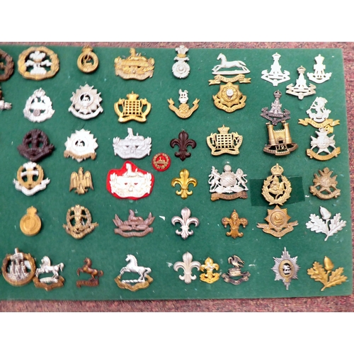 320 - Approx. sixty-five British military cap badges and other insignia, some copies: to include The Royal... 