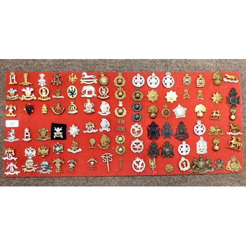 321 - Approx. sixty-four British military cap badges and other insignia, some copies: to include The 17th/... 