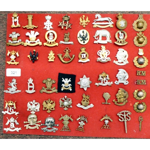 321 - Approx. sixty-four British military cap badges and other insignia, some copies: to include The 17th/... 