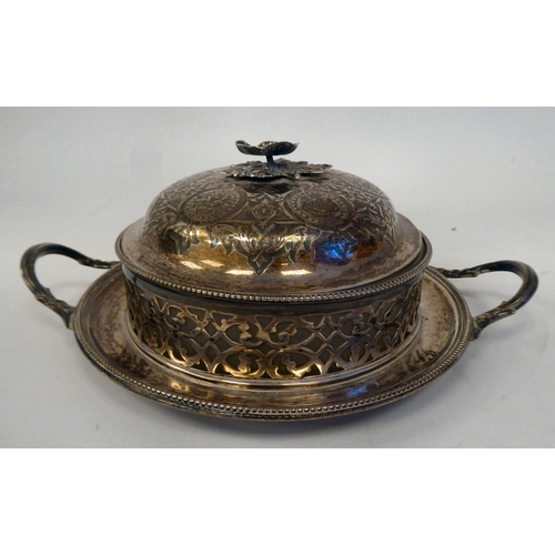 324 - A late Victorian silver butter dish with a frosted glass liner, comprising a decoratively pierced an... 