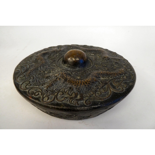 329 - A late 19thC Chinese cast bronze gong, decorated with dragons and scrolled ornament  9