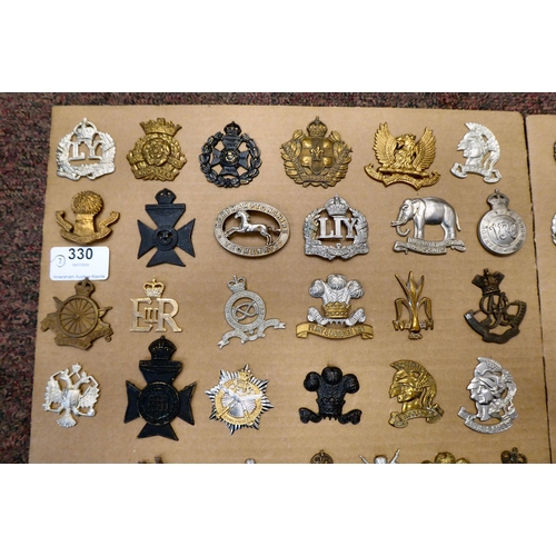 330 - Approx. 100 British military cap badges, some copies: to include Royal Army Ordnance Corps; The Nort... 