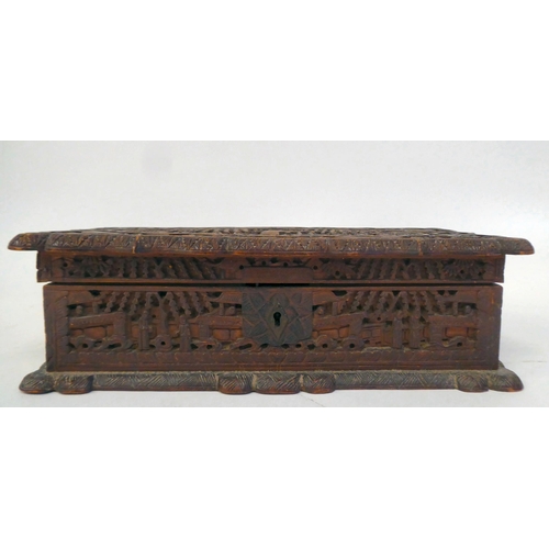 334 - A late 19thC Sino-European softwood casket, allover carved with figures in gardens  3