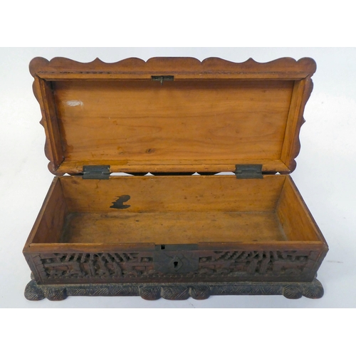 334 - A late 19thC Sino-European softwood casket, allover carved with figures in gardens  3