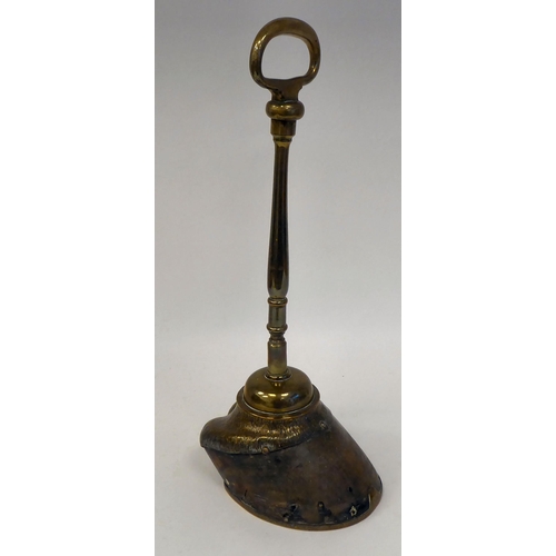 336 - An Edwardian lacquered brass mounted door porter, fashioned as a horse's hoof, the shoe inscribed 'M... 