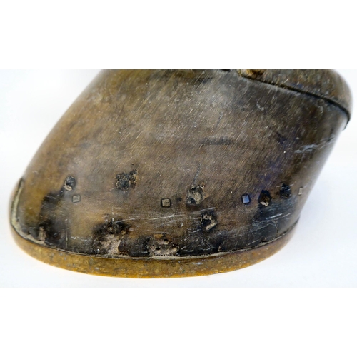 336 - An Edwardian lacquered brass mounted door porter, fashioned as a horse's hoof, the shoe inscribed 'M... 