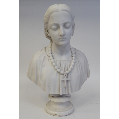 339 - A mid 19thC carved marble bust, a young woman, her hair tied up, wearing a pendant necklet  inscribe... 