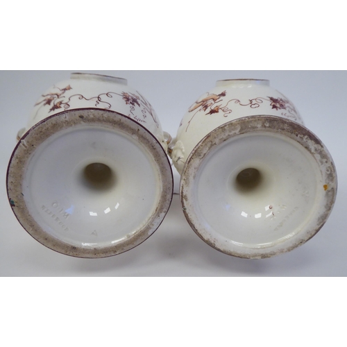 346 - A pair of 19thC Wedgwood cream glazed earthenware, twin handled, ovoid shape, pedestal vases, decora... 