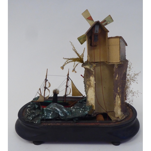 4 - A late 19thC automaton, featuring a ship on the ocean, beside cottages and a windmill, under an oval... 