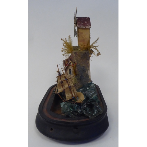 4 - A late 19thC automaton, featuring a ship on the ocean, beside cottages and a windmill, under an oval... 