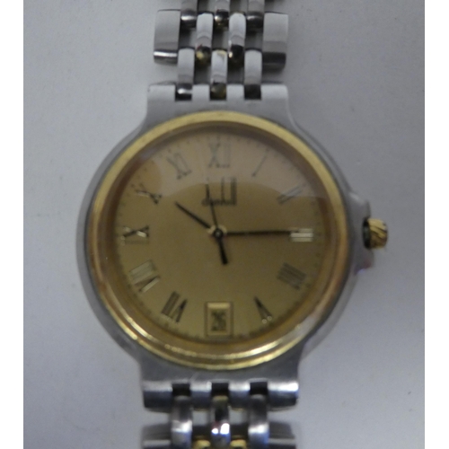 67 - A Dunhill bi-coloured stainless steel bracelet wristwatch, the quartz movement faced by a gilded Rom... 