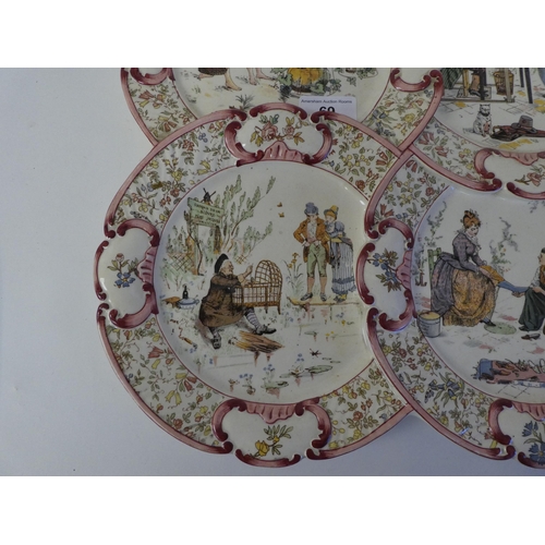 69 - A late 19thC French china wall plaque, fashioned as four overlapping side plates, each depicting art... 