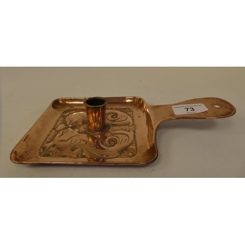 73 - An Arts & Crafts copper chamberstick, the square saucer base embossed and chased with two stylis... 