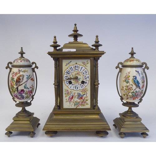 76 - A late 19th/early 20thC three piece brass clock garniture with painted porcelain panels, the clock w... 