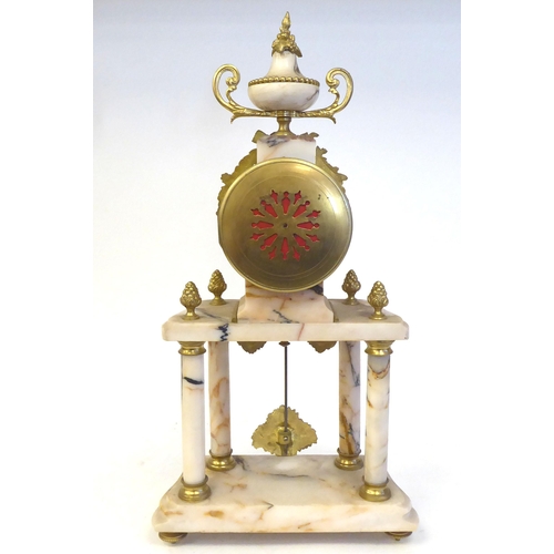 81 - A late 19th/early 20thC French mottled pink marble and gilt metal mounted, three piece clock garnitu... 