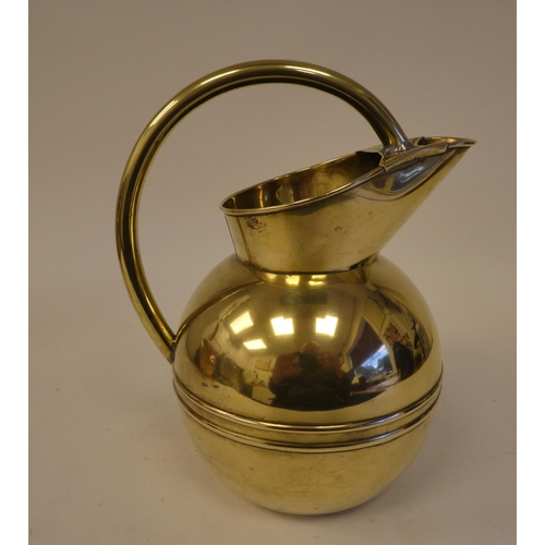 83 - A Christopher Dresser for Henry Loveridge spherical brass water jug with an arched handle and covere... 