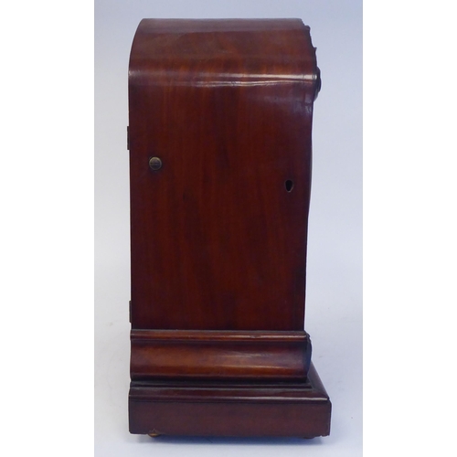 91 - A 19thC mahogany cased, pointed arch top bracket clock with applied, foliate carved mounts, on ball ... 