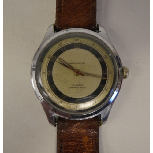 92 - An Incabloc Antimagnetic stainless steel cased wristwatch, faced by an Arabic dial, on a mid brown h... 