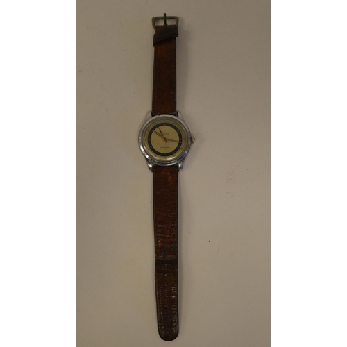 92 - An Incabloc Antimagnetic stainless steel cased wristwatch, faced by an Arabic dial, on a mid brown h... 