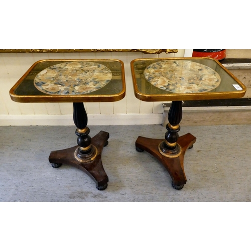 97 - A pair of 19thC style rosewood and parcel gilt side tables, each with a rectangular, glazed top and ... 