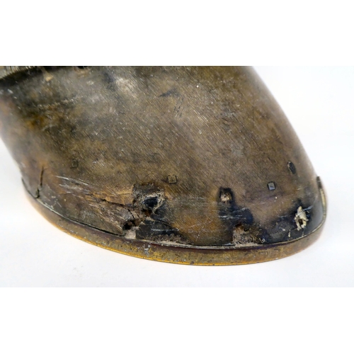 336 - An Edwardian lacquered brass mounted door porter, fashioned as a horse's hoof, the shoe inscribed 'M... 