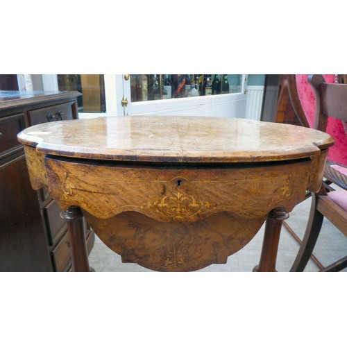 8 - A mid Victorian figured walnut, oval needlework table with marquetry ornament, the quarter veneered ... 