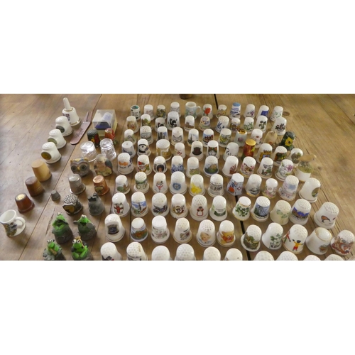 100 - A collection of mainly bone china thimbles