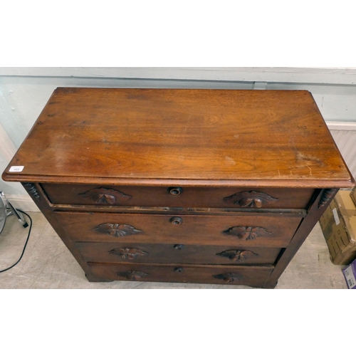 103 - An Art Nouveau period stained mahogany dressing chest with applied, carved handles and mounts, compr... 