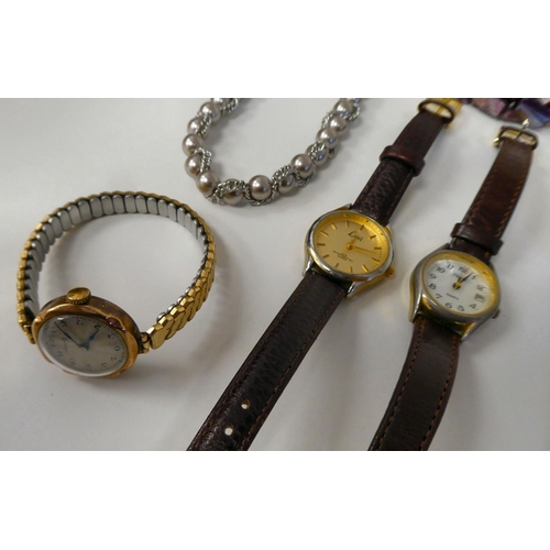 127 - A mixed lot: to include watches; jewellery; and banknotes