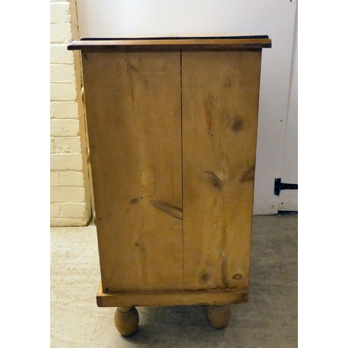 136 - An early 20thC bleached pine, four drawer dressing chest, raised on turned feet  33