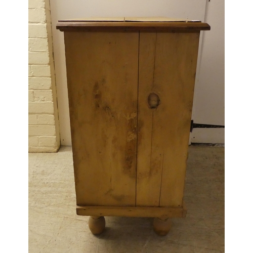 136 - An early 20thC bleached pine, four drawer dressing chest, raised on turned feet  33