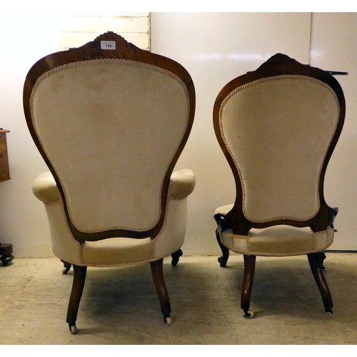 139 - A pair of late Victorian, carved walnut, showwood framed salon chairs, upholstered in mushroom colou... 