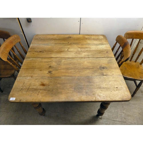 140 - A late 19thC rustic pine, farmhouse style kitchen table, raised on turned legs  29