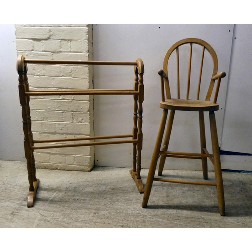 141 - 20thC pine furniture: to include a towel rail, raised on splayed feet  30