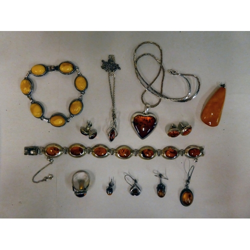 167 - Silver and white metal jewellery, set with amber coloured stones