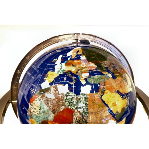 27 - A terrestrial globe, each country set with a regional hardstone, on a gimble fitting  18