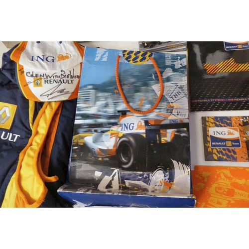 33 - Sporting memorabilia: to include a Fernando Torres signed photograph; and a Renault gilet size L/XL